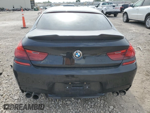 2016 BMW M6 z VIN WBS6E9C53GGF92689, wystawiony jako Copart lot #60226324 z przebiegiem Nie podano mil oraz Szkody całkowita. Historia ofert i sprzedaży dostępna na DreamBid. Obrazek 6.