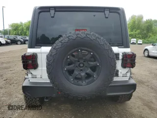 2022 Jeep Wrangler Unlimited Sport S with VIN 1C4HJXDG4NW235781, listed as a Copart auction lot 57184895 with 30,883 mi miles and Salvage title. Bid and sale history available at DreamBid. Image 6.