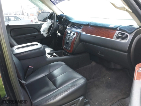 2012 Chevrolet Suburban LT with VIN 1GNSCJE0XCR257186, listed as a IAAI auction lot 41597580 with 174,284 mi miles. Bid and sale history available at carsss.com. Image 5.