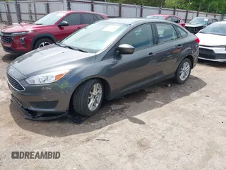 2018 Ford Focus SE with VIN 1FADP3F20JL312395, listed as a IAAI auction lot 42110335 with 110,720 mi miles and . Bid and sale history available at DreamBid. Image 17.