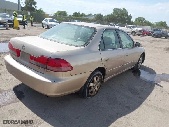 2002 Honda Accord Sdn SE with VIN 1HGCG66812A155003, listed as a IAAI auction lot 41934724 with 192,129 mi miles. Bid and sale history available at carsss.com. Image 4.