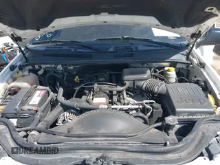 2003 Jeep Grand Cherokee Laredo with VIN 1J4GX48S43C518584, listed as a IAAI auction lot 42213094 with 163,743 mi miles and . Bid and sale history available at DreamBid. Image 10.