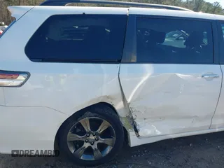 2015 Toyota Sienna SE with VIN 5TDXK3DC4FS658148, listed as a IAAI auction lot 41601341 with 110,329 mi miles. Bid and sale history available at carsss.com. Image 6.