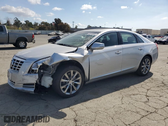 2013 Cadillac XTS Luxury with VIN 2G61P5S39D9187600, listed as a Copart auction lot 53516955 with 67,888 mi miles and Salvage Title. Bid and sale history available at carsss.com. Image 1.