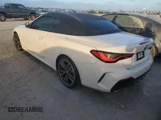 2022 BMW 4 Series M440i with VIN WBA53AT06NCK03623, listed as a Copart auction lot 76490964 with Not provided miles and Salvage title. Bid and sale history available at DreamBid. Image 2.