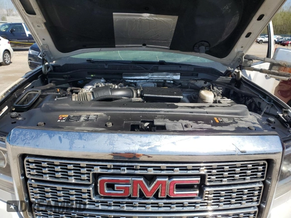 2019 GMC Sierra 2500HD Denali z VIN 1GT12SEY2KF106040, wystawiony jako Copart lot #54123885 z przebiegiem 153 684 mil mil oraz Szkoda całkowita • Salvage title. Historia ofert i sprzedaży dostępna na DreamBid. Obrazek 11.