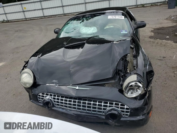 2005 Ford Thunderbird Deluxe z VIN 1FAHP60A55Y102032, wystawiony jako Copart lot #73761144 z przebiegiem 50 402 mil mil oraz Szkoda całkowita • Salvage title. Historia ofert i sprzedaży dostępna na DreamBid. Obrazek 5.