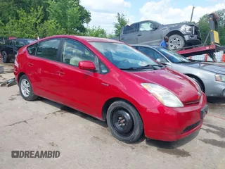 2007 Toyota Prius z VIN JTDKB20U677642273, wystawiony jako IAAI lot #42199968 z przebiegiem 164 524 mil mil oraz . Historia ofert i sprzedaży dostępna na DreamBid. Obrazek 1.