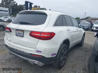 2019 Mercedes-Benz GLC with VIN WDC0G5EB0KF585613, listed as a IAAI auction lot 41892618 with 42,777 mi miles. Bid and sale history available at carsss.com. Image 4.