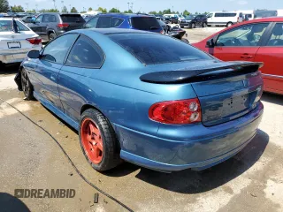 2004 Pontiac GTO z VIN 6G2VX12G24L282560, wystawiony jako Copart lot #67750724 z przebiegiem 153 582 mil mil oraz Szkody całkowita. Historia ofert i sprzedaży dostępna na DreamBid. Obrazek 2.