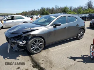 2019 Mazda 3 with VIN JM1BPBJM1K1138290, listed as a Copart auction lot 62129245 with 73,382 mi miles and Salvage title. Bid and sale history available at DreamBid. Image 1.