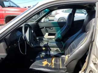 1986 Porsche 944 z VIN WP0AA0954GN155776, wystawiony jako Copart lot #56032785 z przebiegiem 17 696 mil mil oraz Szkoda całkowita • Salvage title. Historia ofert i sprzedaży dostępna na DreamBid. Obrazek 7.