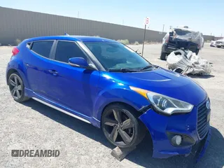 2015 Hyundai Veloster Turbo with VIN KMHTC6AE2FU218570, listed as a IAAI auction lot 42609097 with 104,965 mi miles and . Bid and sale history available at DreamBid. Image 1.