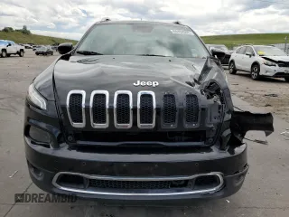 2014 Jeep Cherokee Limited with VIN 1C4PJLDS0EW148212, listed as a Copart auction lot 60464965 with 82,015 mi miles and Salvage title. Bid and sale history available at DreamBid. Image 5.