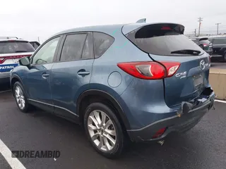 2015 Mazda CX-5 Grand Touring with VIN JM3KE4DY0F0493969, listed as a IAAI auction lot 41581885 with 71,014 mi miles. Bid and sale history available at carsss.com. Image 3.