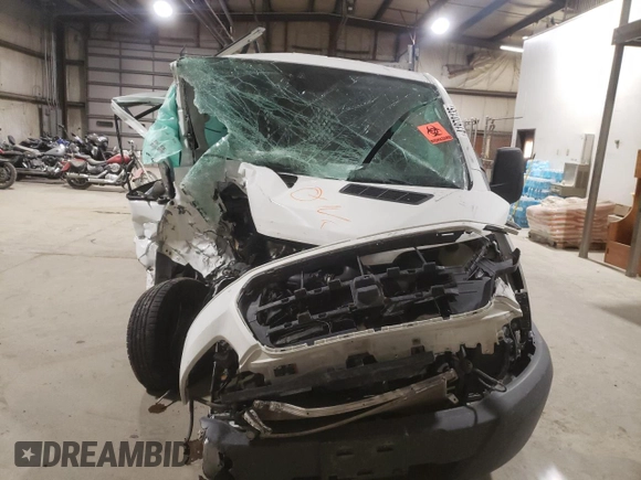 2018 Ford Transit z VIN 1FTYR1ZM0JKB37885, wystawiony jako Copart lot #41970135 z przebiegiem Nie podano mil oraz Szkody całkowita. Historia ofert i sprzedaży dostępna na DreamBid. Obrazek 5.
