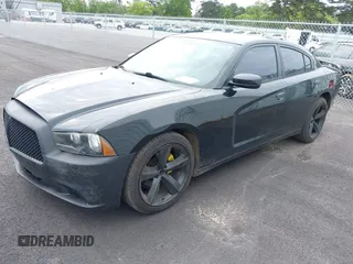 2013 Dodge Charger SE with VIN 2C3CDXBG9DH546130, listed as a IAAI auction lot 42209748 with 214,087 mi miles and . Bid and sale history available at DreamBid. Image 2.