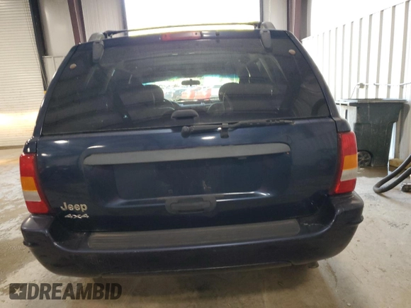 2004 Jeep Grand Cherokee Laredo with VIN 1J4GW48S54C316230, listed as a Copart auction lot 61410875 with 72,083 mi miles and Clean title. Bid and sale history available at DreamBid. Image 6.