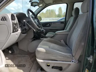 2005 GMC Envoy SLT with VIN 1GKDT13S952144349, listed as a Copart auction lot 71800694 with 137,614 mi miles and Salvage Title. Bid and sale history available at DreamBid. Image 7.
