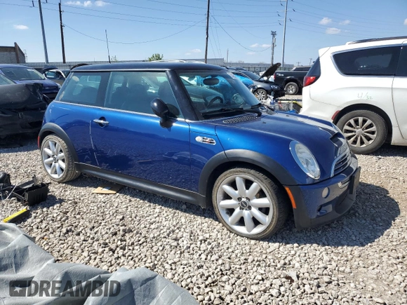 2003 MINI Hardtop S with VIN WMWRE33423TD67736, listed as a Copart auction lot 53428565 with 148,784 mi miles and Clean Title. Bid and sale history available at DreamBid. Image 4.