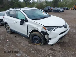 2018 Toyota RAV4 XLE with VIN 2T3WFREV1JW442963, listed as a IAAI auction lot 41777504 with 122,100 mi miles. Bid and sale history available at carsss.com. Image 1.
