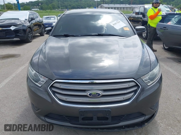 2015 Ford Taurus SEL with VIN 1FAHP2E83FG175051, listed as a IAAI auction lot 42357517 with 200,033 mi miles and . Bid and sale history available at DreamBid. Image 12.