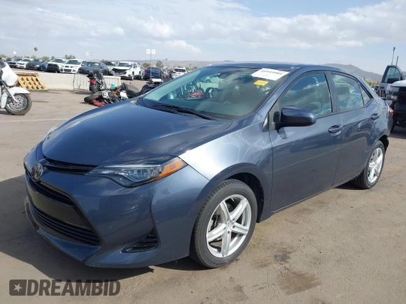 2018 Toyota Corolla L with VIN 5YFBURHEXJP806632, listed as a IAAI auction lot 41933984 with 70,091 mi miles and . Bid and sale history available at DreamBid. Image 18.