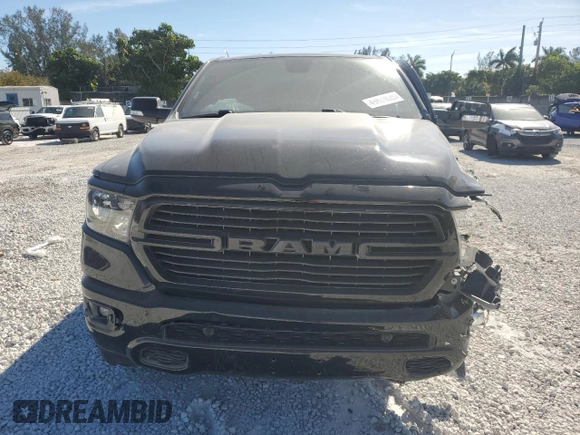 2021 Ram 1500 Lone Star with VIN 1C6RREFT2MN660620, listed as a Copart auction lot 49831035 with 49,276 mi miles and Salvage title. Bid and sale history available at DreamBid. Image 5.