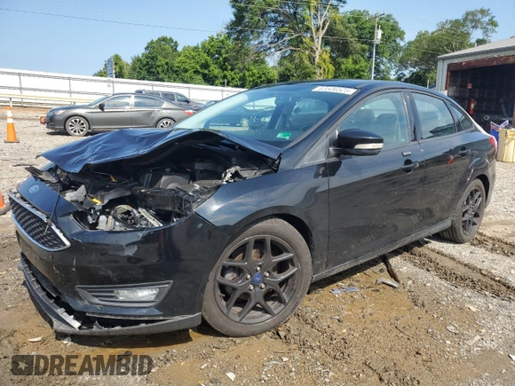 2016 Ford Focus SE with VIN 1FADP3F21GL228871, listed as a Copart auction lot 63506525 with 62,756 mi miles and Salvage title. Bid and sale history available at DreamBid. Image 1.