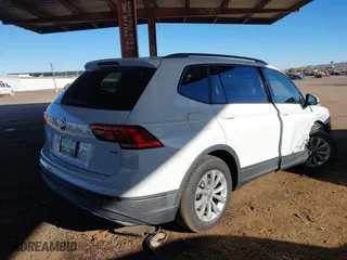 2018 Volkswagen Tiguan S with VIN 3VV1B7AX3JM091025, listed as a IAAI auction lot 41395912 with 58,840 mi miles. Bid and sale history available at carsss.com. Image 4.