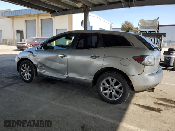 2009 Mazda CX-7 Grand Touring z VIN JM3ER29L990226899, wystawiony jako Copart lot #50071505 z przebiegiem 167 124 mil mil oraz Szkoda całkowita • Salvage title. Historia ofert i sprzedaży dostępna na DreamBid. Obrazek 2.
