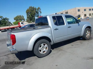 2007 Nissan Frontier SE with VIN 1N6AD07UX7C427340, listed as a IAAI auction lot 42664098 with 211,396 mi miles and . Bid and sale history available at DreamBid. Image 4.
