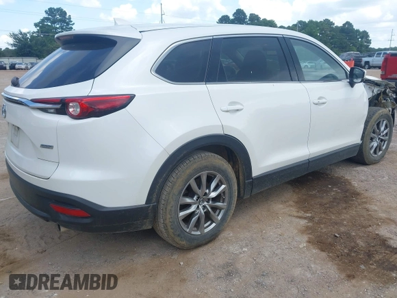 2018 Mazda CX-9 Touring with VIN JM3TCACY7J0222569, listed as a IAAI auction lot 42670932 with 130,644 mi miles and . Bid and sale history available at DreamBid. Image 4.