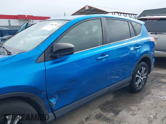 2018 Toyota RAV4 LE with VIN JTMBFREV8JJ220630, listed as a IAAI auction lot 42001795 with 86,027 mi miles. Bid and sale history available at carsss.com. Image 17.