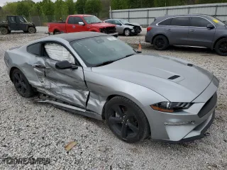 2022 Ford Mustang EcoBoost with VIN 1FA6P8TH4N5127680, listed as a Copart auction lot 51009515 with 23,539 mi miles and Salvage Title. Bid and sale history available at carsss.com. Image 4.