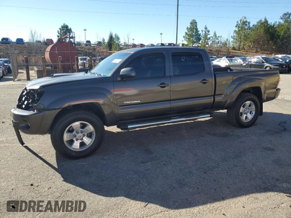 2010 Toyota Tacoma PreRunner with VIN 3TMKU4HN3AM025218, listed as a Copart auction lot 87600035 with 92,605 mi miles and Salvage title. Bid and sale history available at DreamBid. Image 1.