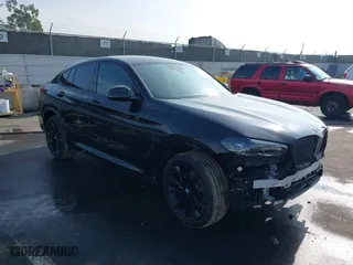 2023 BMW X4 xDrive30i with VIN 5UX33DT06P9T14070, listed as a IAAI auction lot 41175973 with 13,527 mi miles. Bid and sale history available at carsss.com. Image 1.