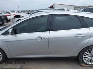 2015 Ford Focus Titanium with VIN 1FADP3N23FL356822, listed as a IAAI auction lot 41981053 with 115,584 mi miles and . Bid and sale history available at DreamBid. Image 15.