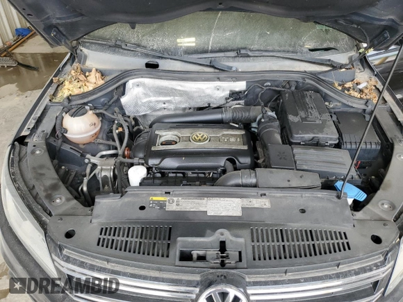 2013 Volkswagen Tiguan S with VIN WVGAV3AX1DW602083, listed as a Copart auction lot 57977515 with 114,375 mi miles and Clean title. Bid and sale history available at DreamBid. Image 12.
