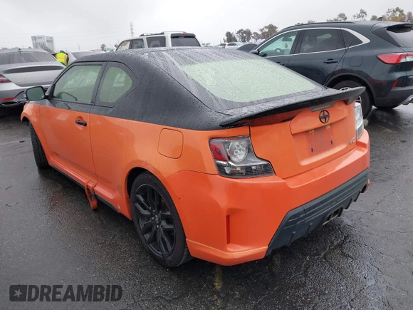 2015 Scion tC with VIN JTKJF5C79FJ007842, listed as a IAAI auction lot 41560881 with 155,436 mi miles. Bid and sale history available at carsss.com. Image 3.