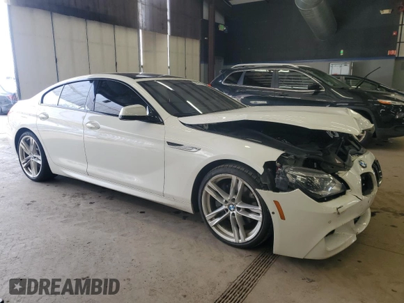 2015 BMW 6 Series 650i xDrive with VIN WBA6B4C54FD761440, listed as a Copart auction lot 45851515 with 64,060 mi miles and Salvage Title. Bid and sale history available at DreamBid. Image 4.