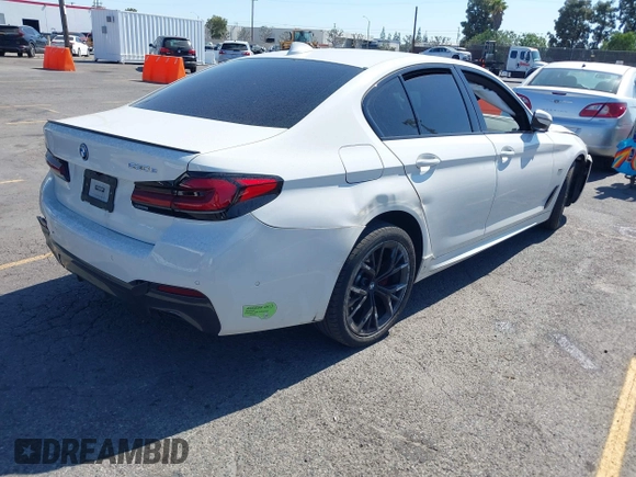 2023 BMW 5 Series 530e with VIN WBA13AG09PCM41820, listed as a IAAI auction lot 42409541 with 17,715 mi miles and . Bid and sale history available at DreamBid. Image 4.
