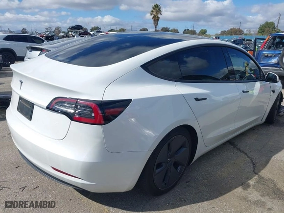 2023 Tesla Model 3 with VIN 5YJ3E1EA6PF488405, listed as a IAAI auction lot 41570896 with 26,631 mi miles. Bid and sale history available at carsss.com. Image 4.