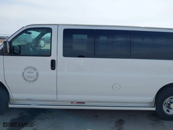 2013 Chevrolet Express Passenger 1LT with VIN 1GAZG1FA1D1191719, listed as a IAAI auction lot 42124977 with 92,228 mi miles. Bid and sale history available at carsss.com. Image 14.