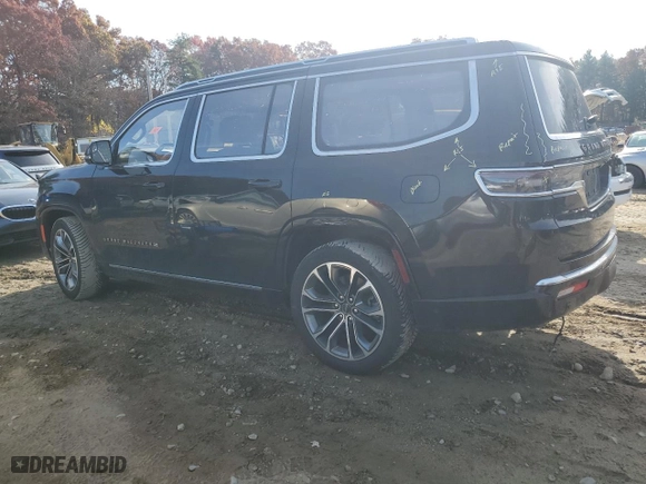 2022 Jeep Grand Wagoneer Series III with VIN 1C4SJVGJ9NS112597, listed as a Copart auction lot 74935494 with 30,594 mi miles and Salvage Title. Bid and sale history available at carsss.com. Image 2.