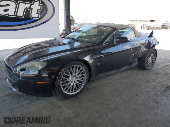 2009 Aston Martin Vantage z VIN SCFBF04CX9GD11858, wystawiony jako Copart lot #53907885 z przebiegiem 87 495 mil mil oraz Szkody całkowita. Historia ofert i sprzedaży dostępna na DreamBid. Obrazek 1.