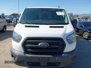 2020 Ford Transit Cargo with VIN 1FTBR1Y83LKA67103, listed as a IAAI auction lot 42408599 with 76,837 mi miles and . Bid and sale history available at DreamBid. Image 12.