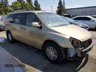 2011 Kia Sedona LX with VIN KNDMG4C75B6372298, listed as a Copart auction lot 62143844 with 180,287 mi miles and Salvage Title. Bid and sale history available at carsss.com. Image 4.
