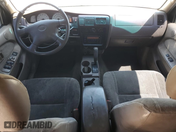 2004 Toyota Tacoma PreRunner z VIN 5TEGN92N14Z331415, wystawiony jako Copart lot #56596545 z przebiegiem 339 810 mil mil oraz Szkoda całkowita • Salvage title. Historia ofert i sprzedaży dostępna na DreamBid. Obrazek 8.