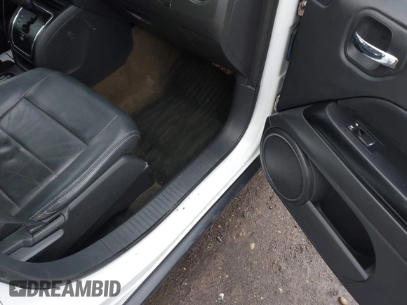 2016 Jeep Patriot Latitude with VIN 1C4NJPFAXGD749306, listed as a IAAI auction lot 41474439 with 94,767 mi miles and . Bid and sale history available at DreamBid. Image 5.